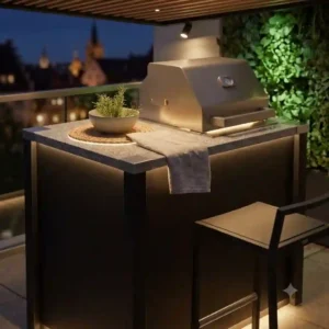 A sophisticated evening shot of the patio illuminated by integrated lighting within the outdoor küchenmöbel design modern.